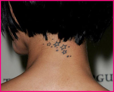 neck tattoos for girls. letter tattoos on neck.