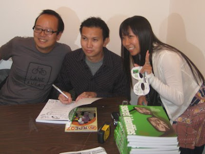Jeff Yang, Jimmy J. Aquino and the masked Secret Identities fan from the photo at the top of the post. Photo by Giant Robot.
