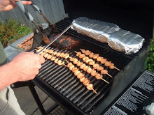 Tom cooking Shrimp and Roast on the Barbie