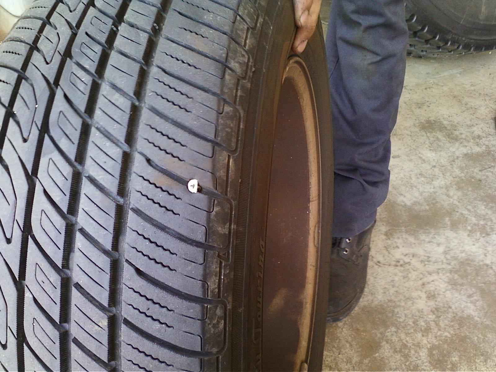 In down back Tire, nail plugged in. Man make work have