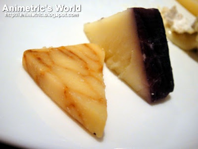 Chipotle Pepper flavored cheese and Cheddar dipped in Camembert
