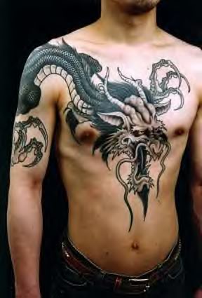 dragon sleeve tattoo. tribal tattoo dragon