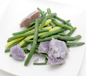 Boiled green beens with purple potatoes