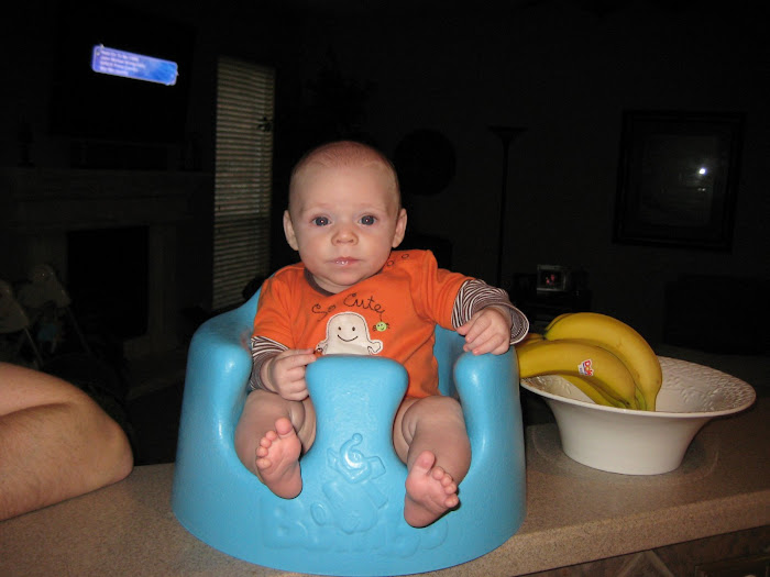 Alex sits up in his Bumbo!