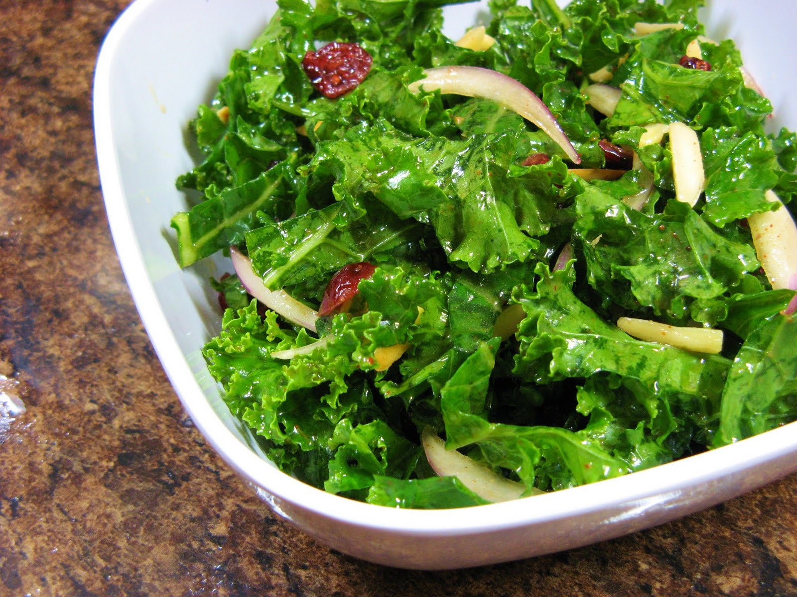 The WellFed Newlyweds Raw Kale Salad with Almonds and Cranberries