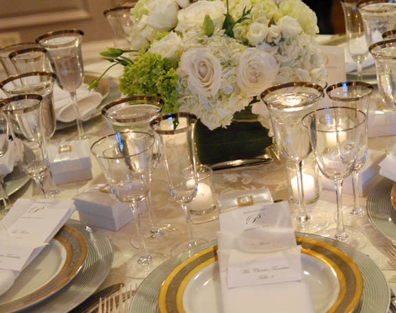 Wedding reception dinner table featuring handmade White Thai silk 