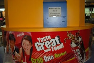 Suggestion Box in Singapore food court Coke