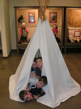 Two of my nephews and my little brothers in a teepee at Fort WallaWalla Museum