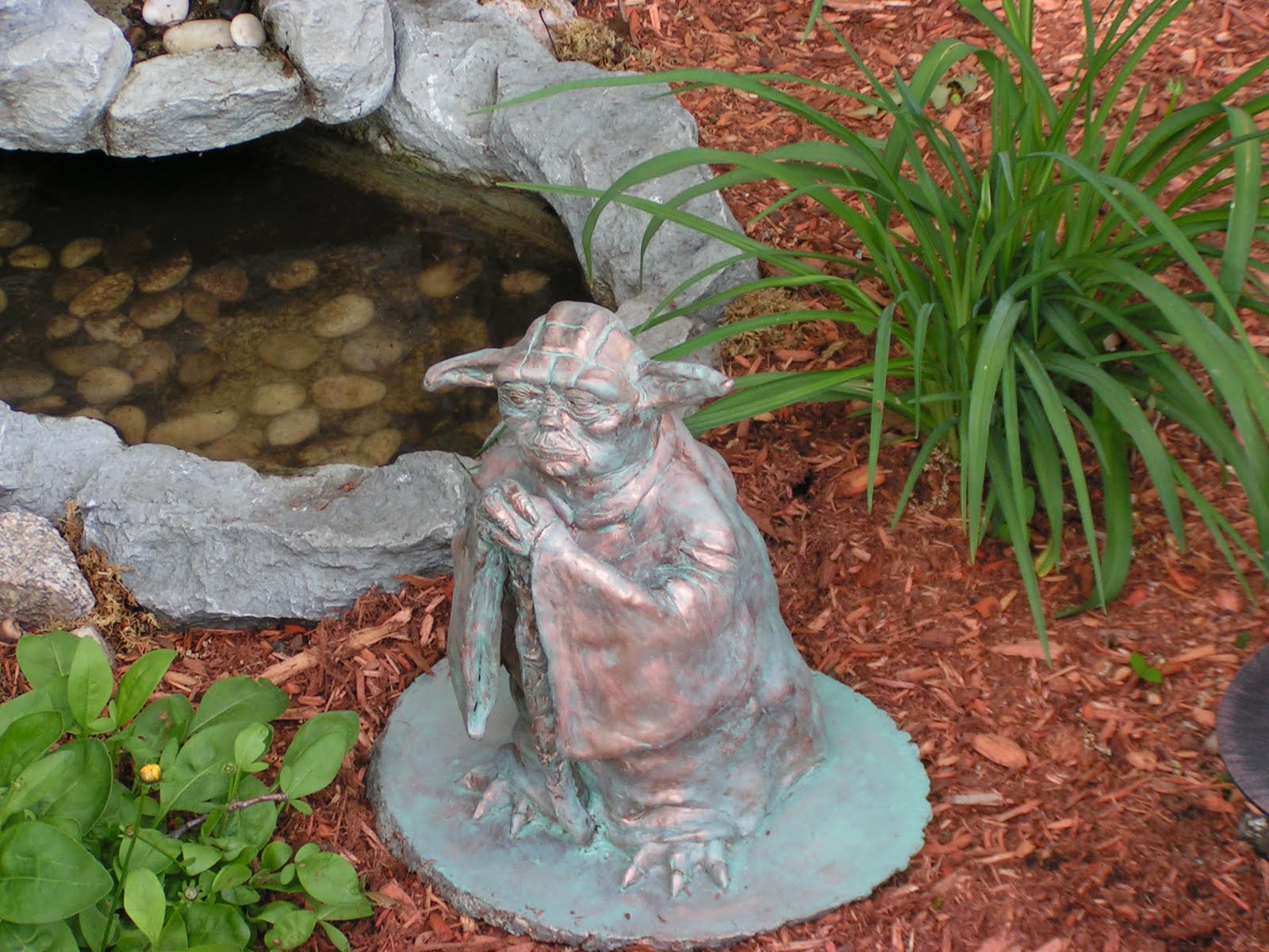 Whoops I think I broke it... Project Yoda Garden Statue