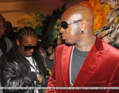 Ok, Lil' Wayne's Face tattoo's are a little out there but look at Baby.