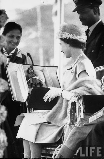 Queen+Elizabeth+II+presented+with+a+turbaned+doll%252C+a+Girl+Guide+gift+to+her+son+Prince+Andrew%252C+during+state+visit+-+New+Delhi+1961