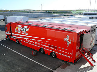 A Ferrari truck displaying Ferrari's Sponsors