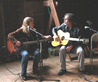 dar williams and jackson brownep playing guitars in rehearsal practice of their songs and lyrics for the event or show in theater hot picture