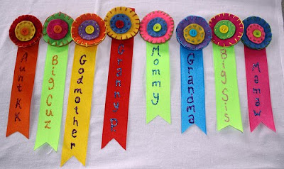 State fair ribbons with different family member titles on them