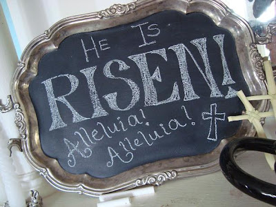 Blackboard reading "He is risen again alleluia alleluia"