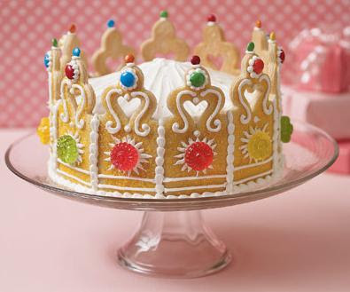 Crown cake on cake stand with pink background