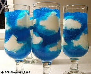 Wine glasses with blue and white Jell-O made to look like a sky with clouds