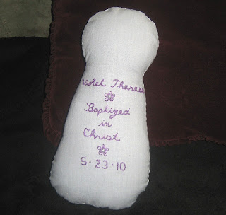 St. Therese Doll back with writing