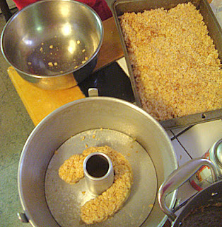 Rice Krispie in a pan and a bowl with Rice Krispie made into an arch