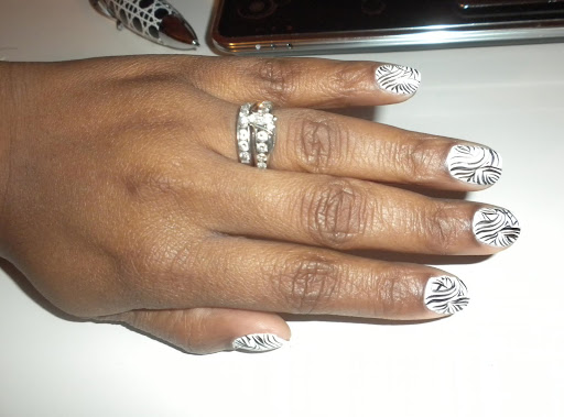 We both got bright colors and funky nail art designs. LOVING my zebra nails!