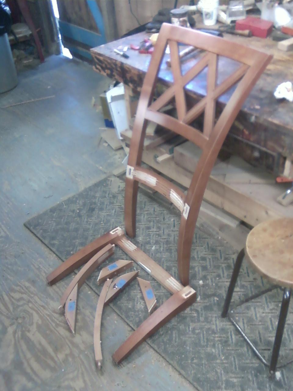 John Mark Power, Antiques Conservator Gluing some loose chairs