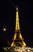 The Eiffel Tower at night is sensational. We sat nearby as the sun set and .