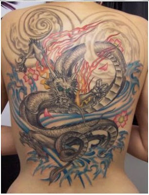 tattoos on back. dragon ack tattoo.