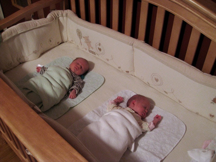 Boston Twins Waking Up in a New Crib