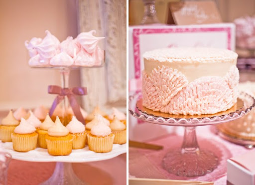 This lovely pink dessert table created by One Girl Cookies was created for a