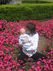 Me and Mommy sitting in the Flowers