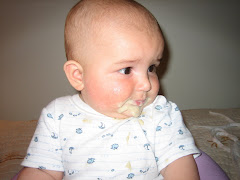 Wearing my first meal. Mmmmm oatmeal cereal