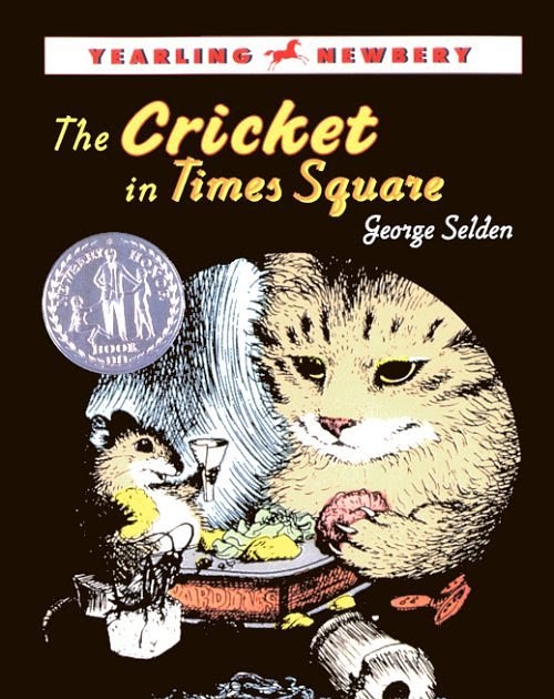 Momo celebrating time to read The Cricket in Times Square by Selden