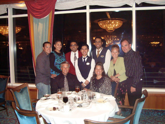 Our Head Waiter in Red, Main Waiter Noel next to me, Assistant Waiter Munir in front