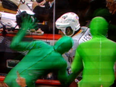 Green Guys Behind the Bench