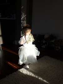 Of course, she's an angel for Halloween!