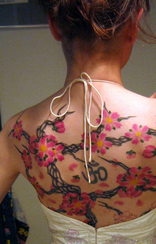 Tattoo On Middle Back. ack in the middle of