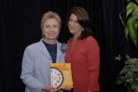 Hillary Clinton holding my cookbook