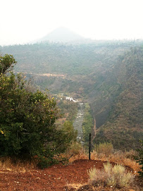 Waterfall in smoke-filled valley