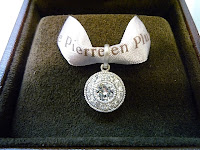 リ･スタイル後はクラシカルチャーミングなペンダントトップになりました。