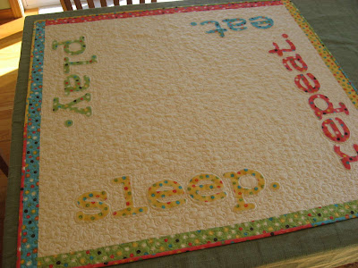 eat. play. sleep. repeat. quilt finally finished!