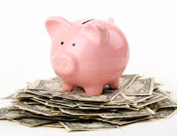 piggy-bank-on-money-md%5B1%5D.jpg