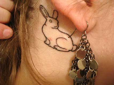 tattoo on neck for girls. Pet tattoo designs on girls