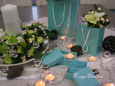  blue or ribbon wrapping the vase with that Tiffany blue silk ribbon