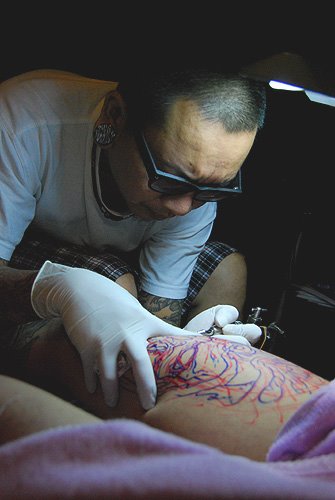 guest tattoo artist kinn in 71st skin slavery, 2009