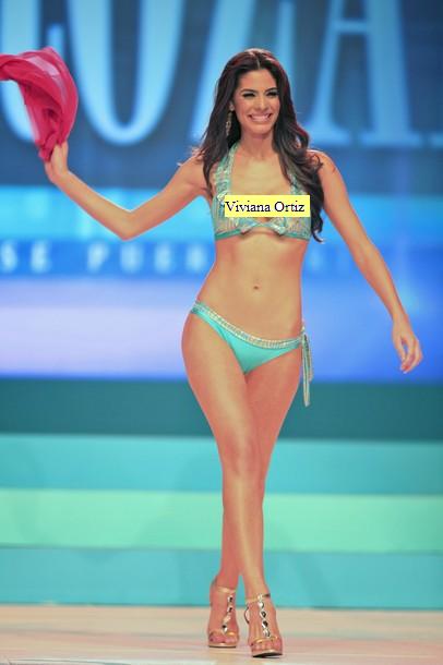 Viviana Ortiz from Corozal walks during the swimsuit segment of the Miss Pu...