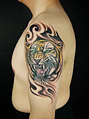 A Tiger Tattoo Design with colored head and black and white backward
