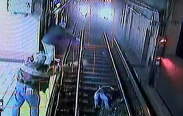 Woman Falling Onto Track As Train Approach In Boston