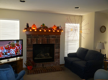 I took a picture of our Halloween decorations. See the giant spider web in front of the window?