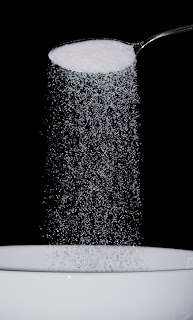 pouring sugar