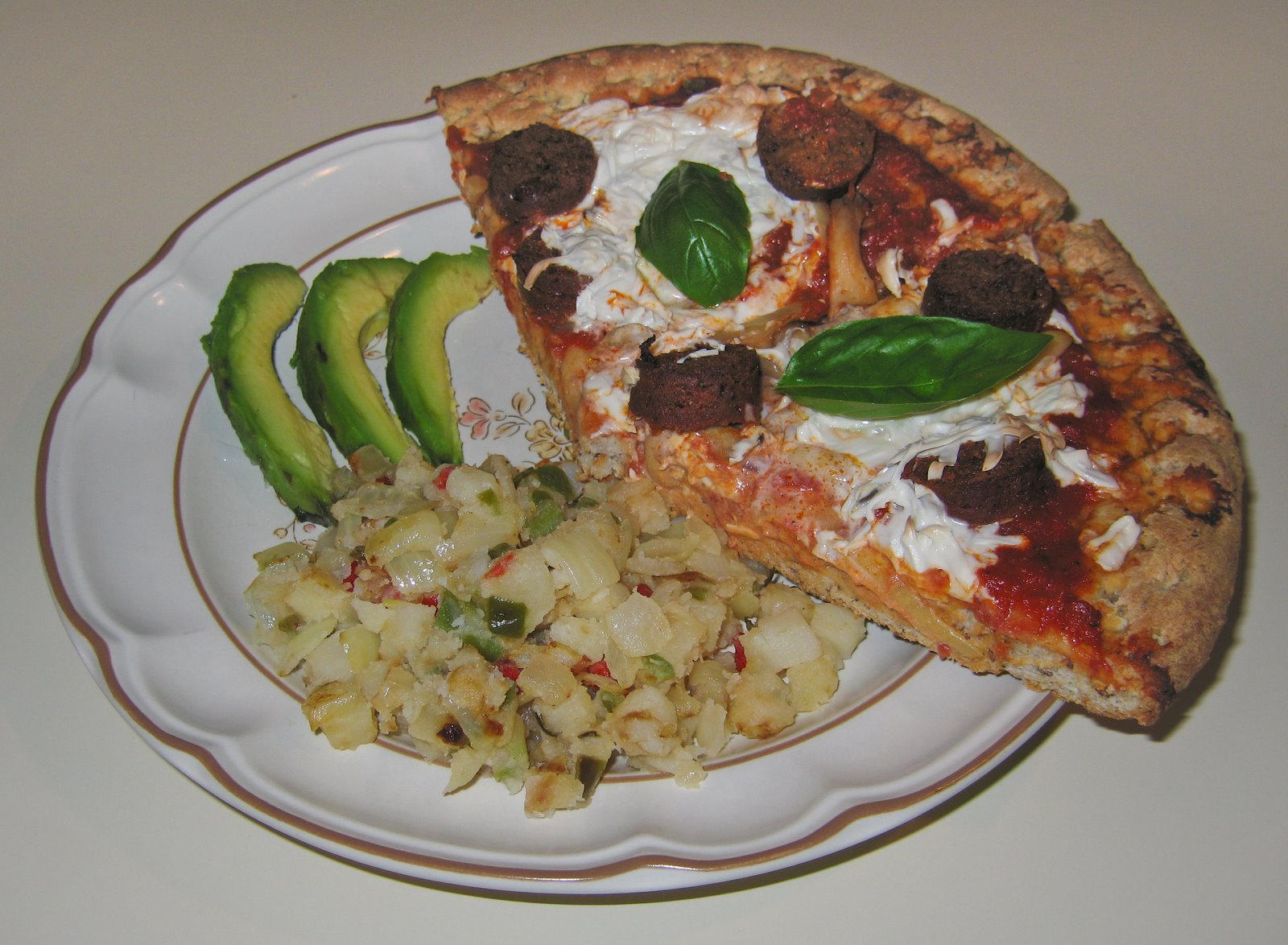 [20090526+Teese+Vegan+Mozzarella+with+Chipotle+Sausage+and+Mushroom+Millet-Flax+Pizza.jpg]